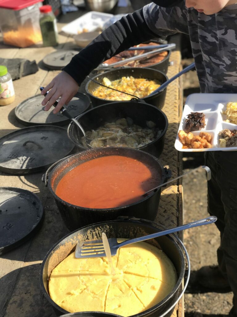 variety of foods in dutch ovens